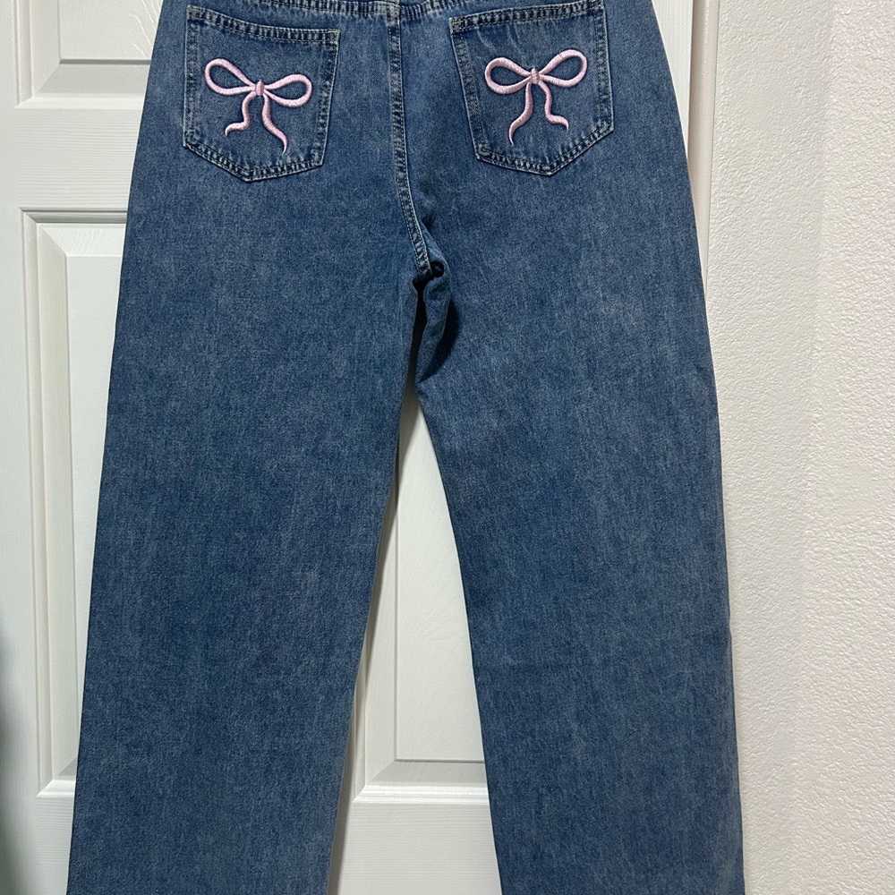 Women's Blue Jeans with Pink Bow Detail
